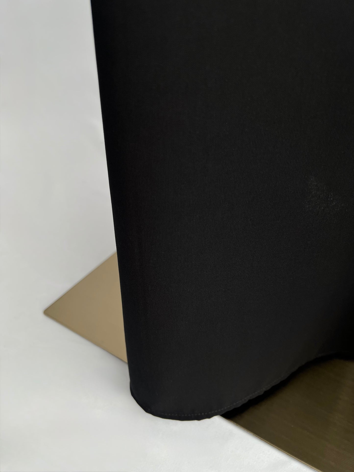 Close-up of fabric drape at lower hem on Essential Zip Abaya