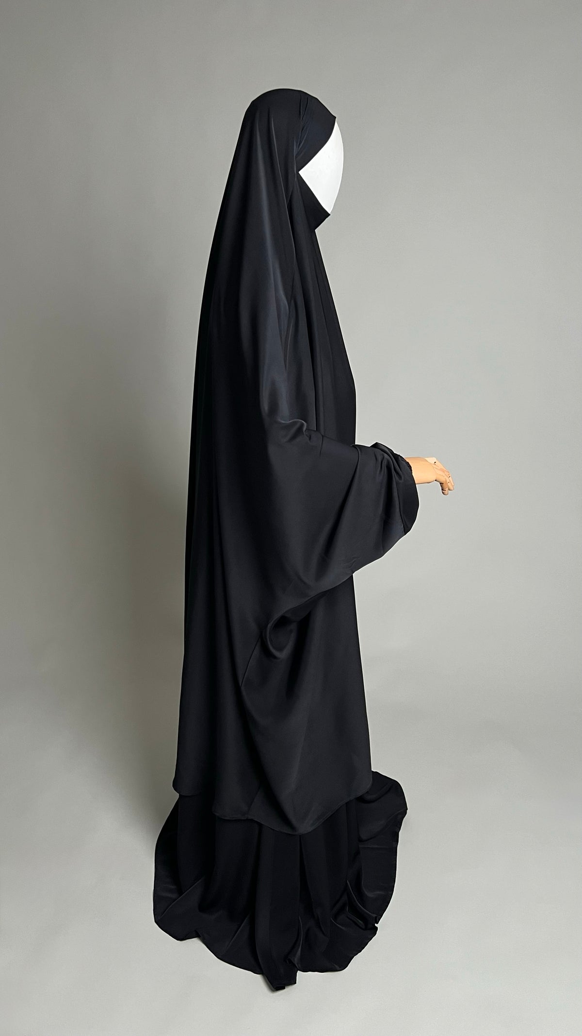 Black Sumayyah Two-Piece Jilbab, side profile view showing the long khimar and skirt