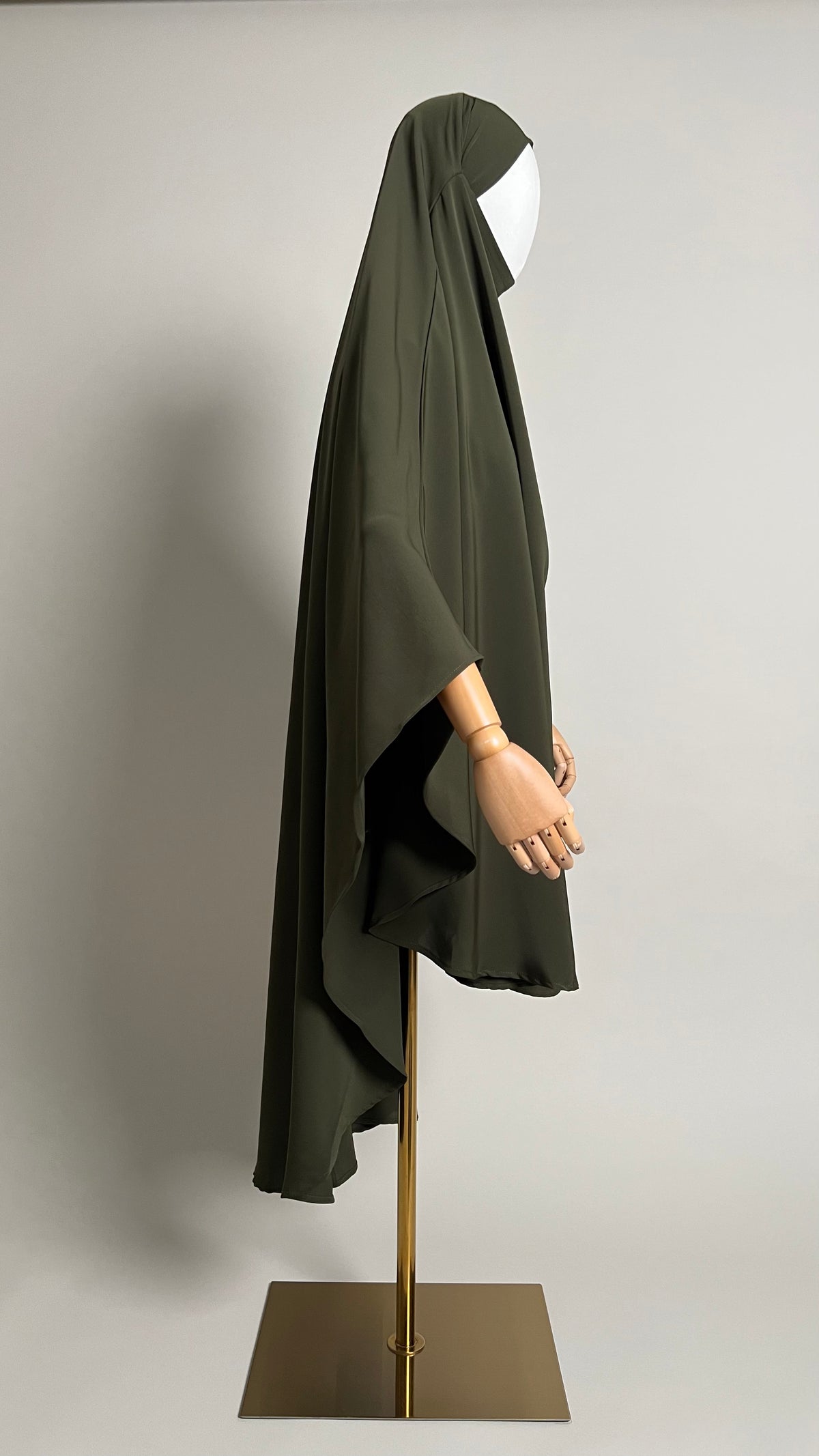 Olive green Sheimaa Rounded Khimar in Korean Nida, side profile view showing the length