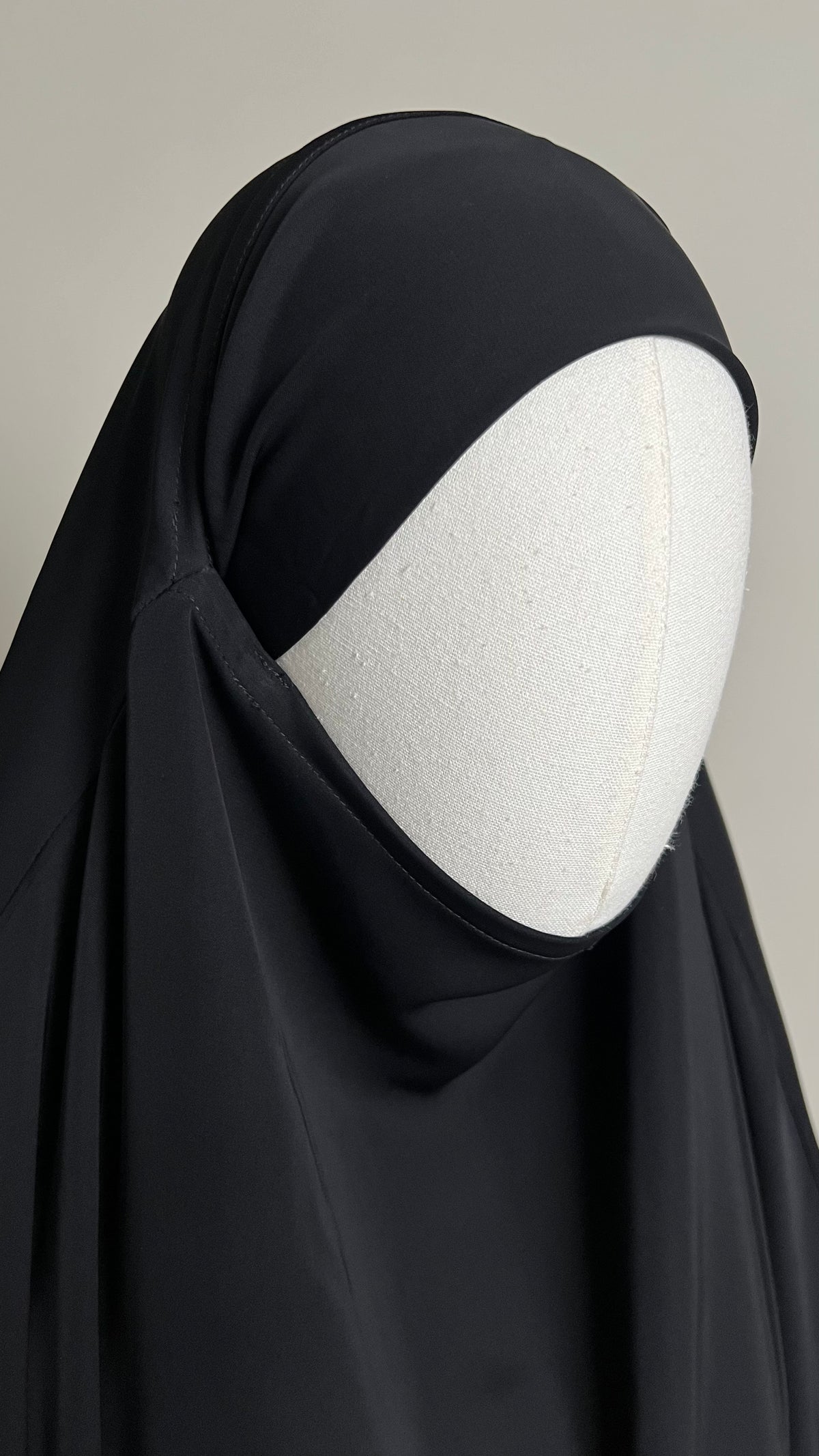 Close-up of the black Sheimaa Rounded Khimar around the face and chin