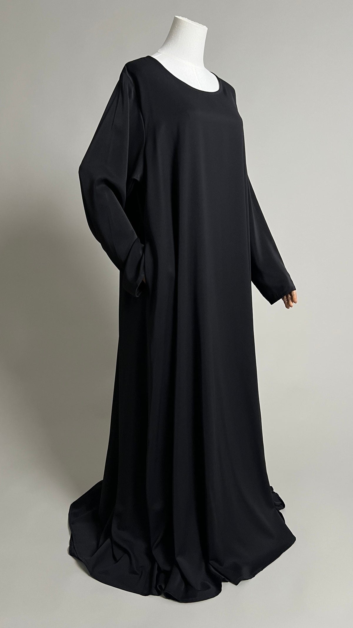 Black Safiyyah Closed Abaya, full-length three-quarter view