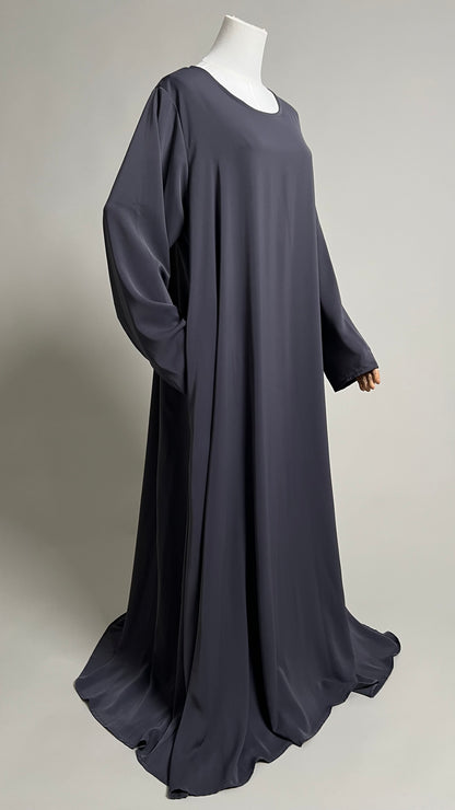 Dark grey Safiyyah Closed Abaya, full-length three-quarter view