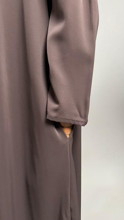 Close-up of the sleeve and side pocket on the coffee Safiyyah Closed Abaya