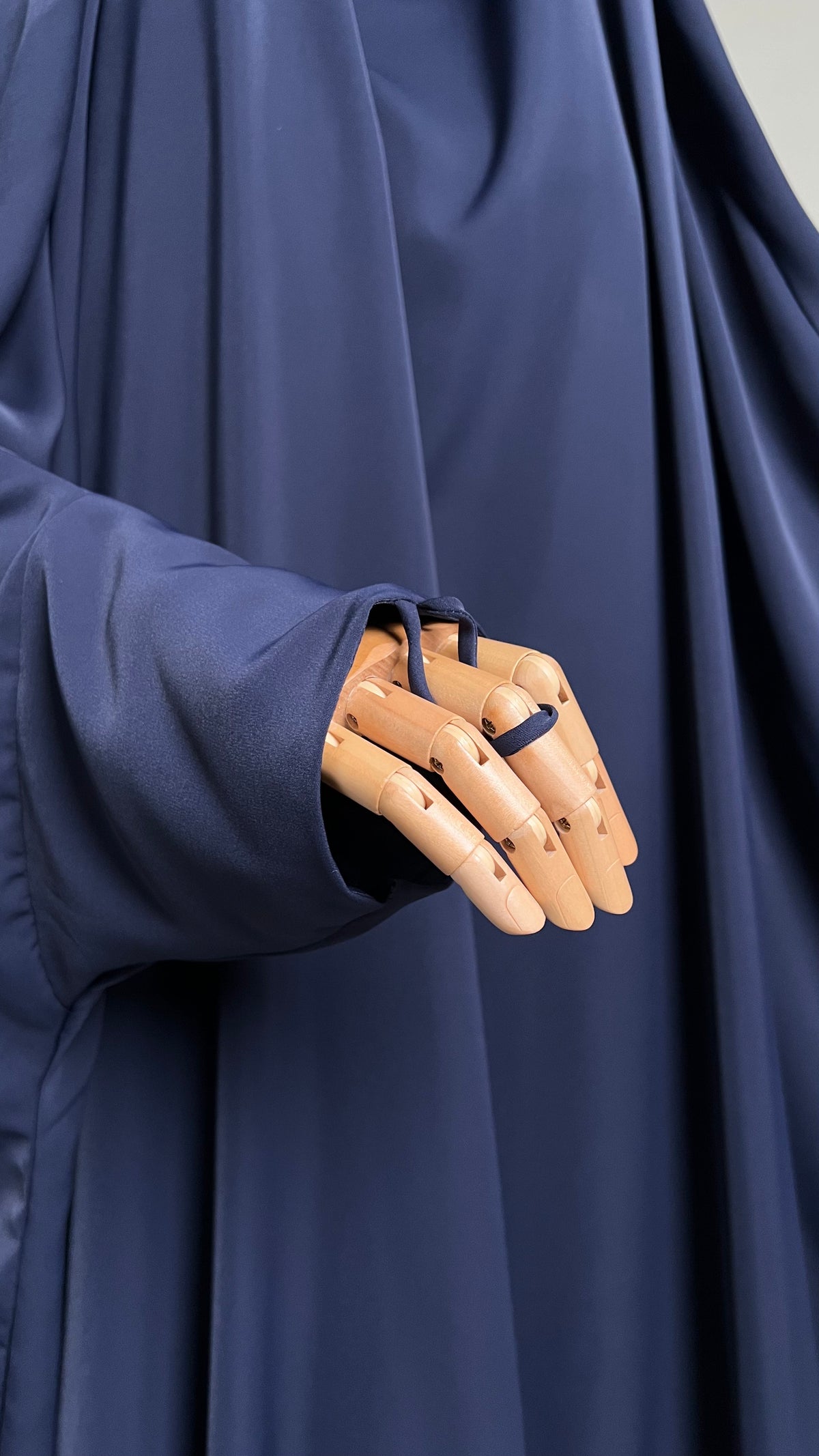 Close-up of the sleeve and finger loop on the Baritone Blue Zaynab One-Piece Jilbab
