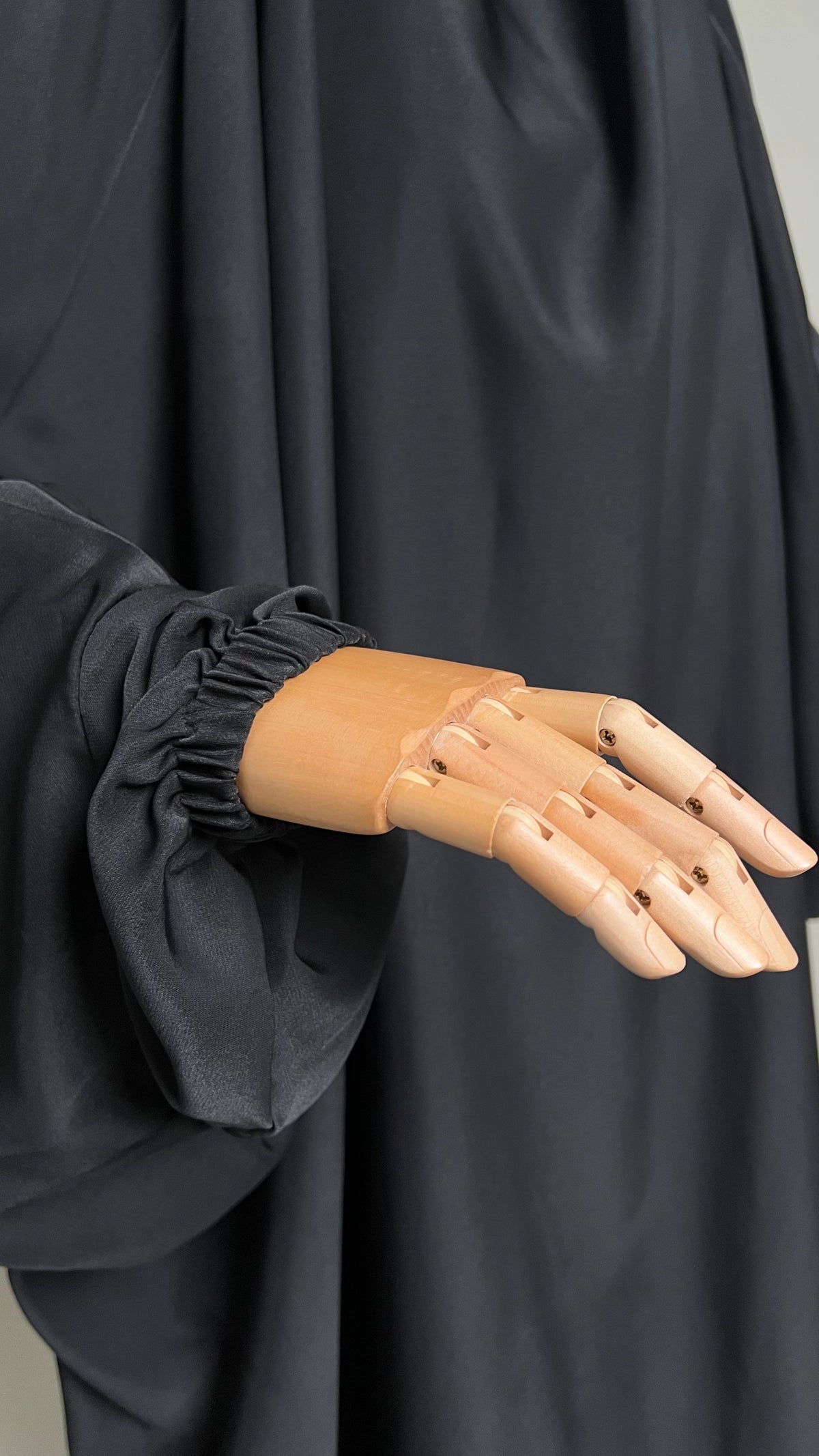 Close-up of the elasticated cuff on the black Sumayyah Two-Piece Jilbab