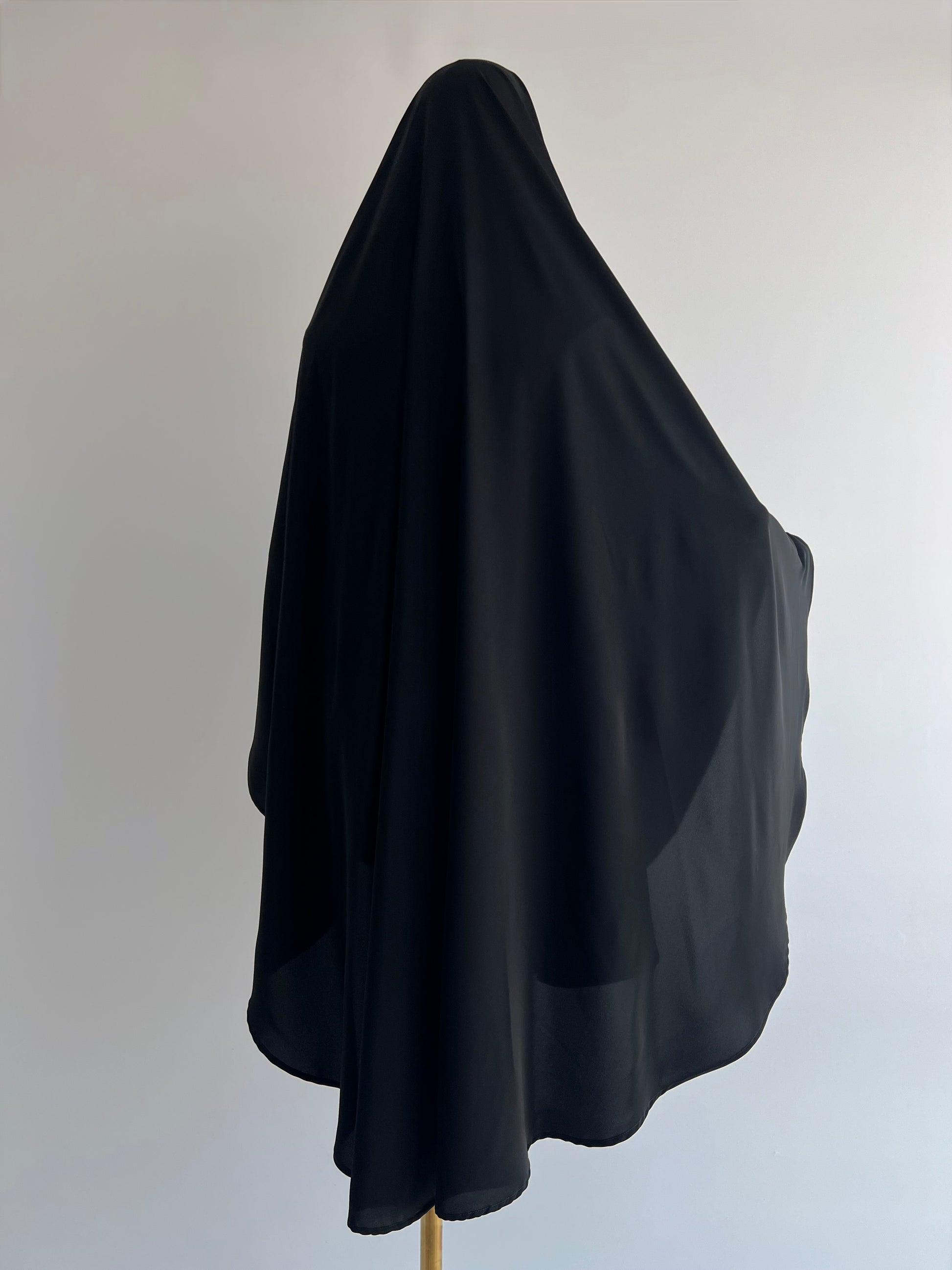 Indonesian Style Khimar in black, full back view on mannequin