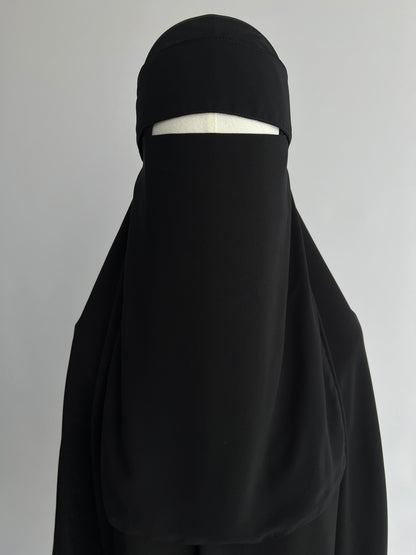 Niqab and Hijab Set in black, front view on mannequin