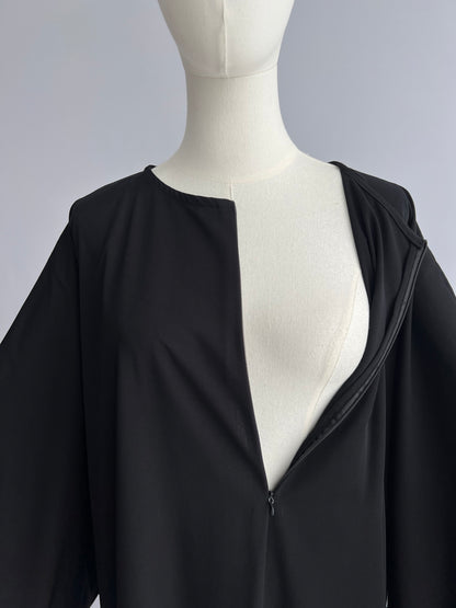 Essential Zip Abaya with front zip fully open, showing width and interior