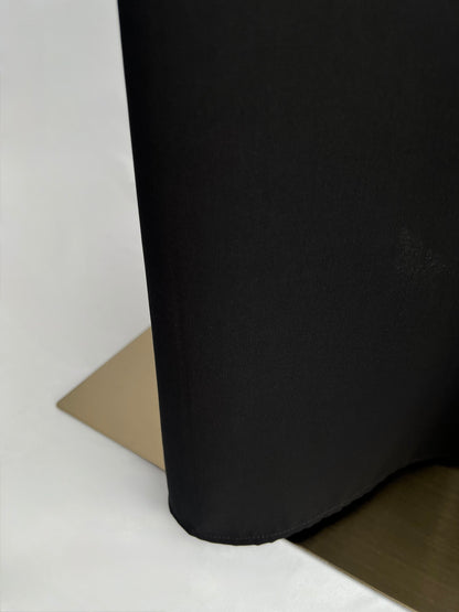 Close-up of fabric drape at lower hem on Essential Zip Abaya